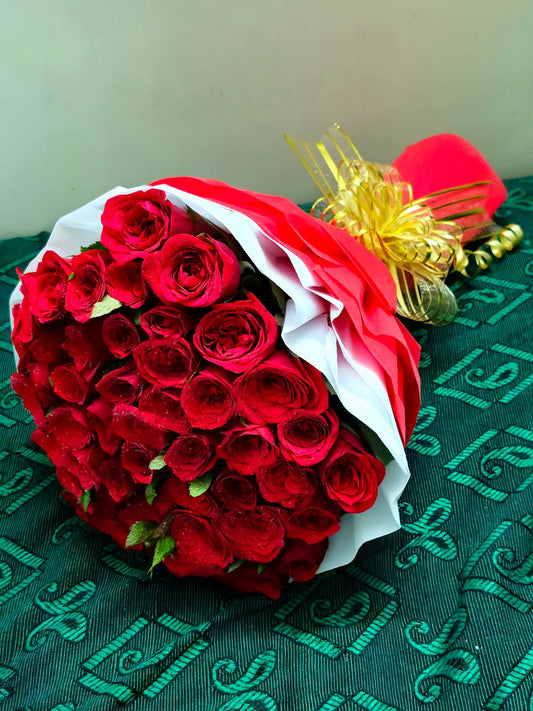 Love's Blushing Embrace (50 Red Roses Premium Bouquet