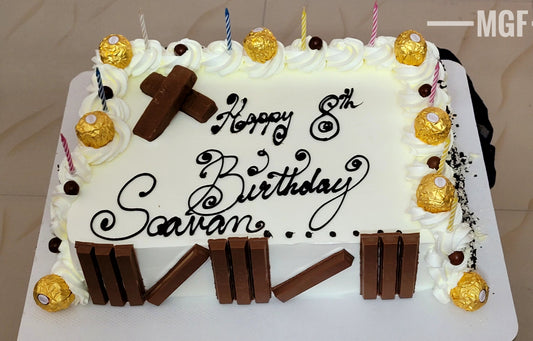 Kitkat Butterscotch Cake decorated with Ferrero Rocher