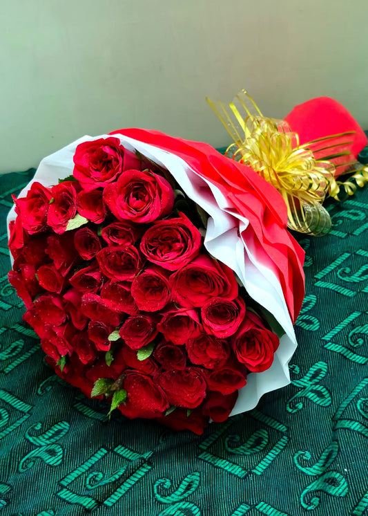 Love's Blushing Embrace (50 Red Roses Premium Bouquet