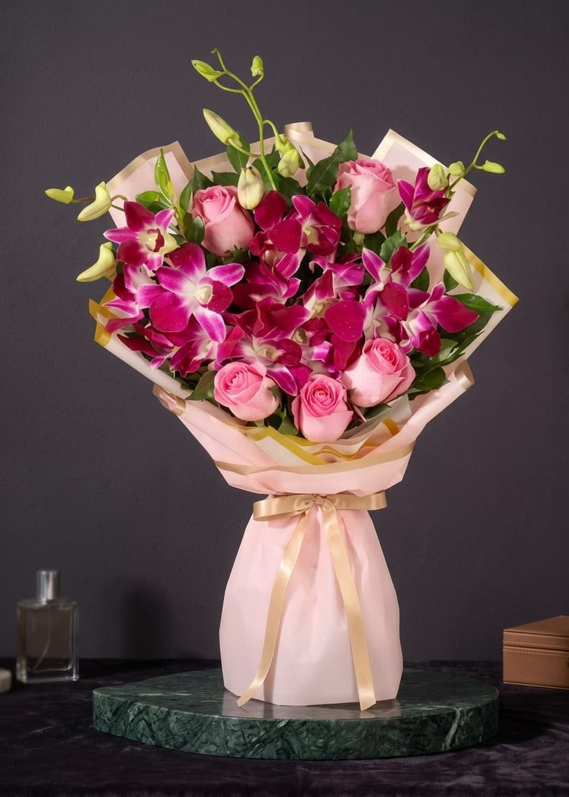 Whispers Of Affection rose & orchids bouquet
