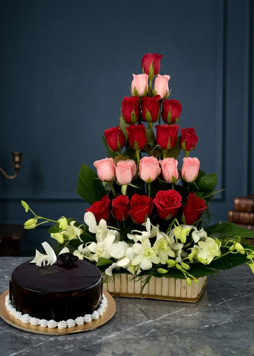 Bloomy Orchids, Roses and Choco Cake Combo